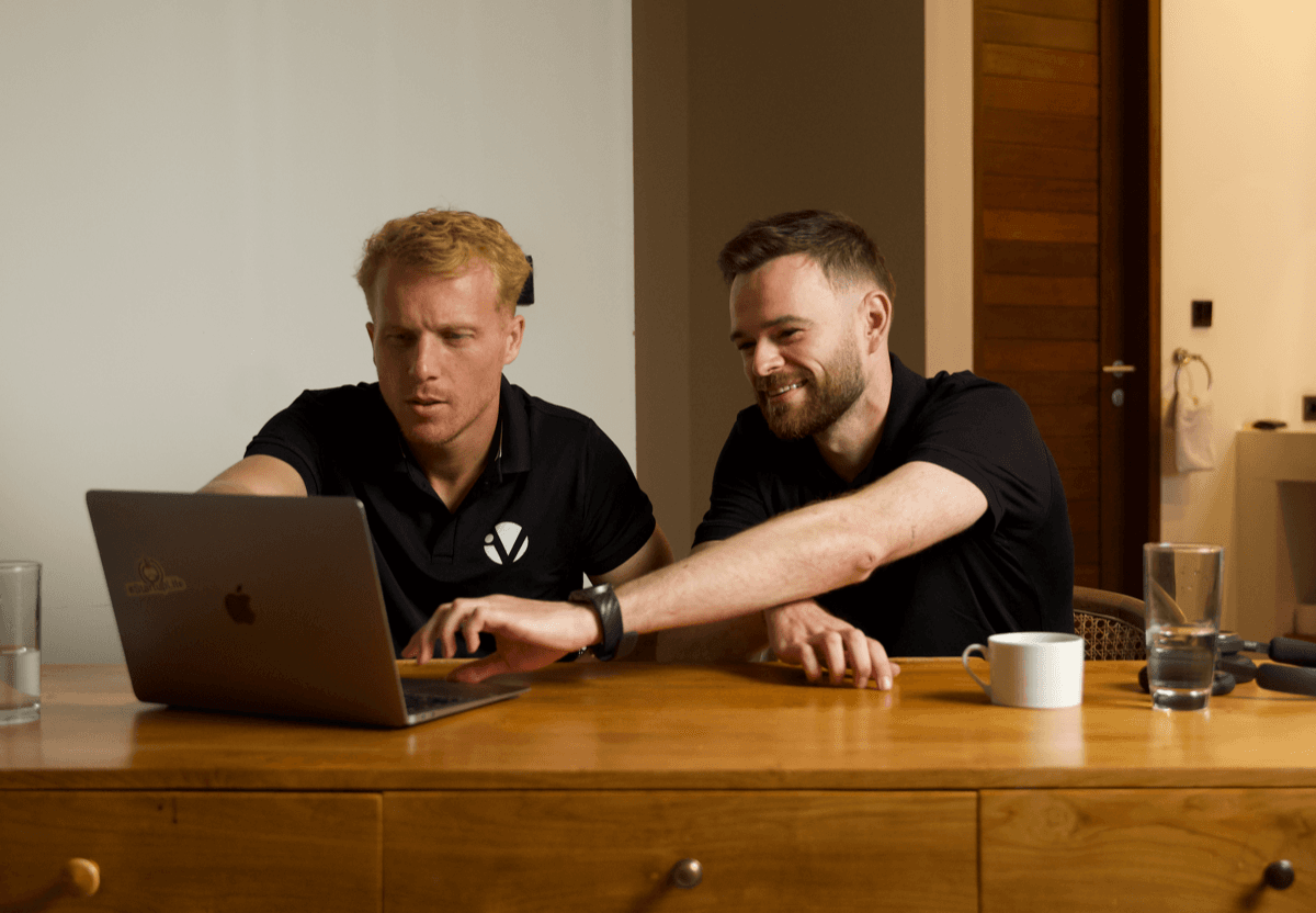 Visiblie team reviewing AI visibility work
